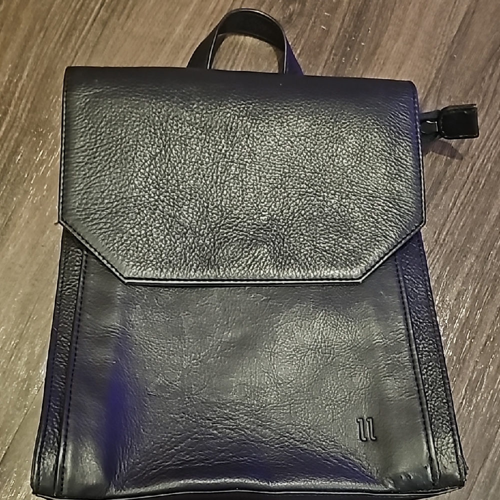 black genuine leather backpack.
